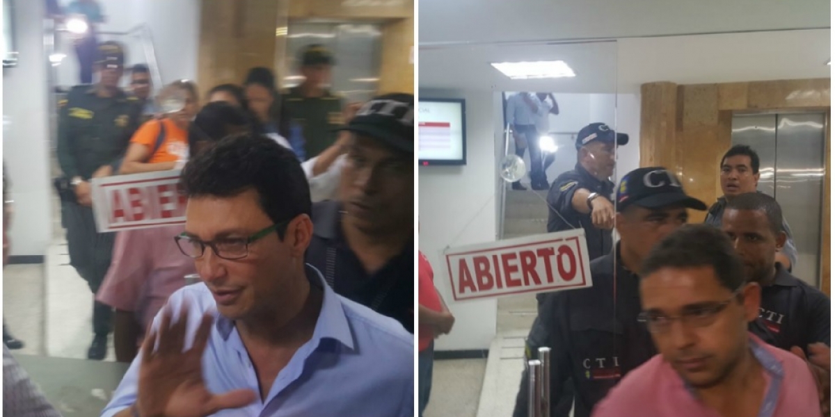 Seguimiento.co Momento en que Carlos Caicedo y Rafael Martínez salían de la audiencia.