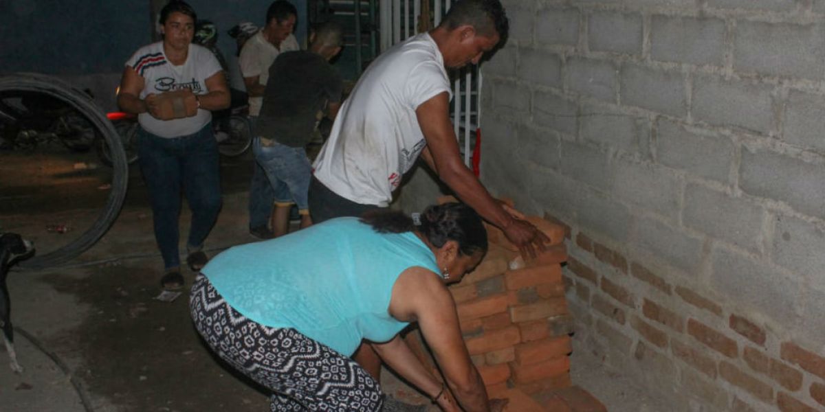 Entrega de ayudas a familias en Nacho Vives.