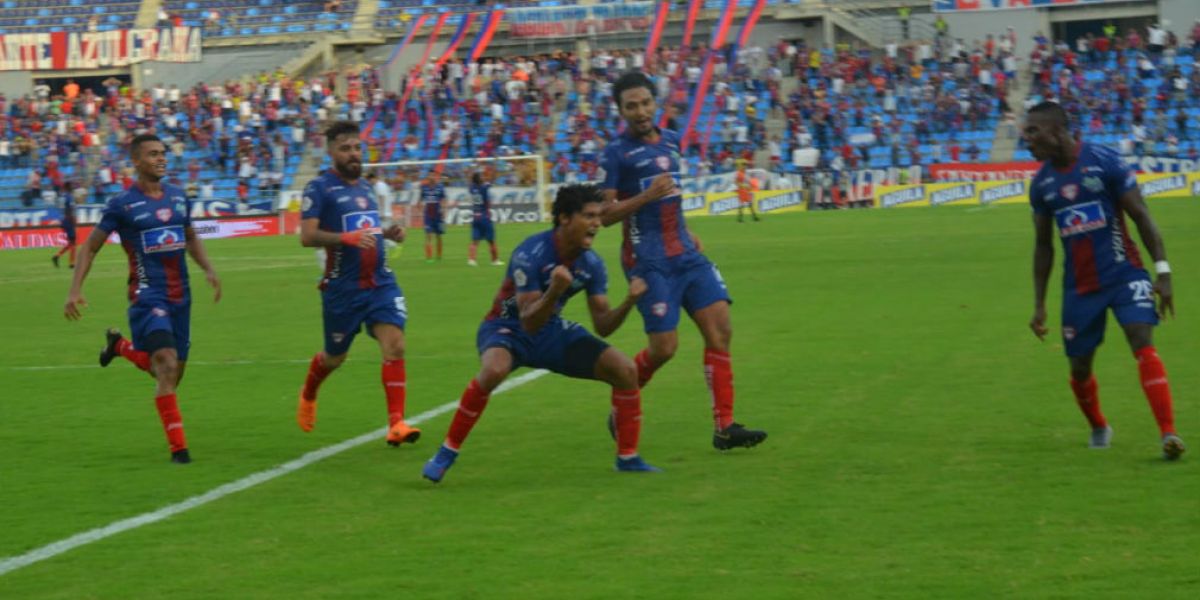 Juan Carlos Pereira celebra su gol contra el Cali.