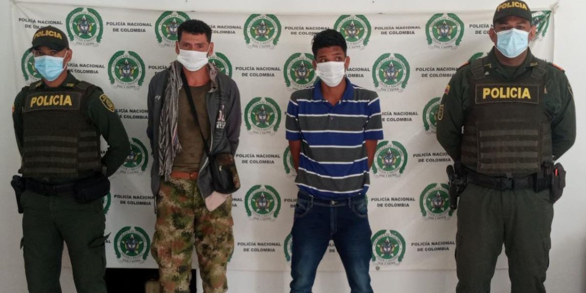 Policía del Magdalena Dennis Jesús Vergara Durán y Jorge Alberto Zabaleta Martínez.