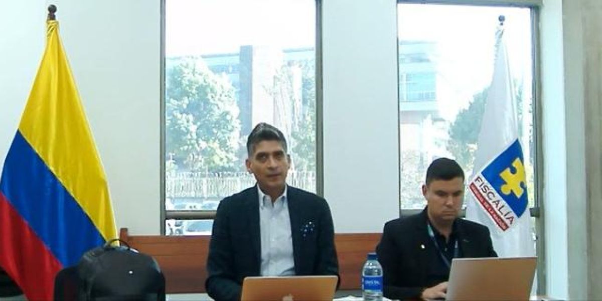 El Fiscal Mario Burgos (izquierda) durante la audiencia de Days Vásquez.