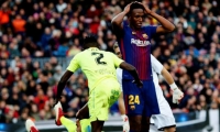  El defensa colombiano del Barcelona Yerry Mina (d) en su partido ante el Getafe.