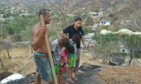 En cenizas quedó la casa de la familia.