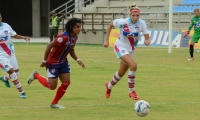 Momentos del partido entre el Unión Femenino y las Tiburonas del Junior Femenino, que se jugó este domingo en el estadio Sierra Nevada.