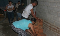 Entrega de ayudas a familias en Nacho Vives.