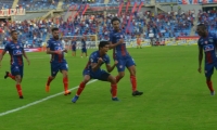 Juan Carlos Pereira celebra su gol contra el Cali.