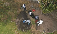 Labores de exhumación en el cementerio de Dabeiba.