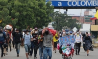 Más de 1.6 millones de venezolanos han decidido radicarse en Colombia, muchos de ellos huyendo de su gobierno. 