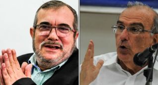Rodrigo Londoño (Timochenko) y Humberto de la Calle.