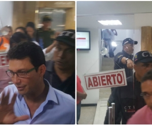 Momento en que Carlos Caicedo y Rafael Martínez salían de la audiencia.