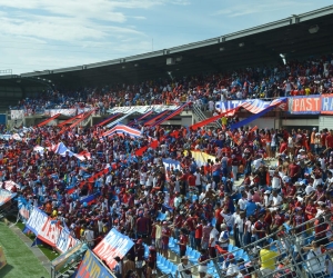 Hinchas felices con el resultado. 