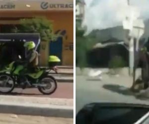 Agente de la Policía chocando a bordo de un bicitaxi