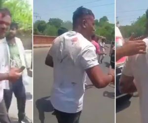 Vishwash Kumar Ramesh caminando hacia una ambulancia.