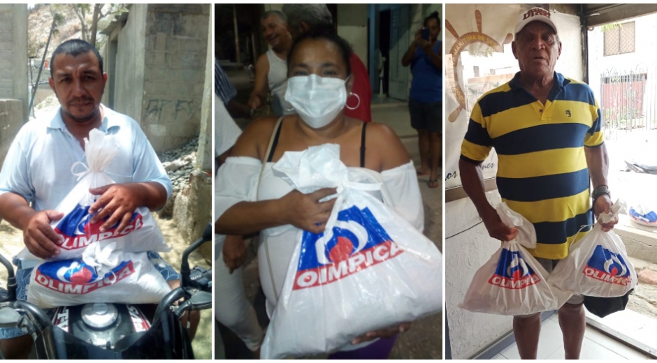 Beneficiados con los mercados solidarios.