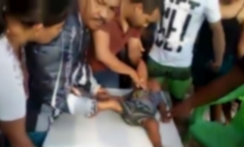 Captura de video. Momentos en el menor era reanimado por el lanchero.