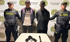 Dos capturados con arma de fuego, luego de hurtar una Tienda D1